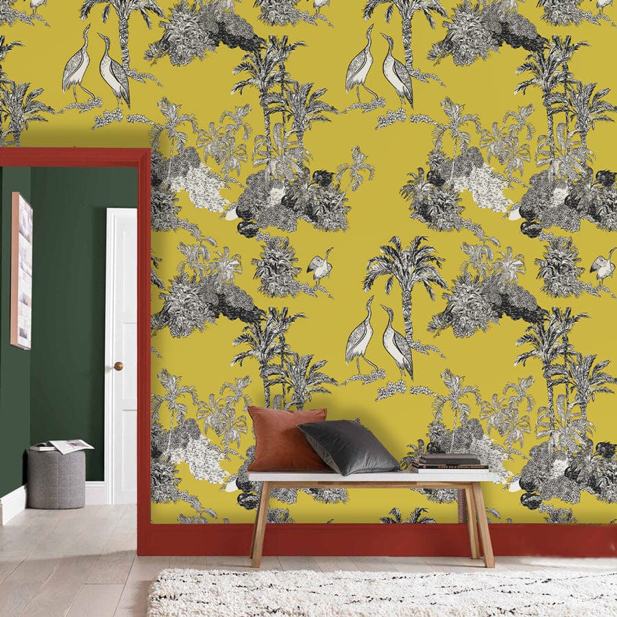 Golden Tropical Oasis Toile Style Wallpaper in yellow and grey with tropical design; hallway setting.