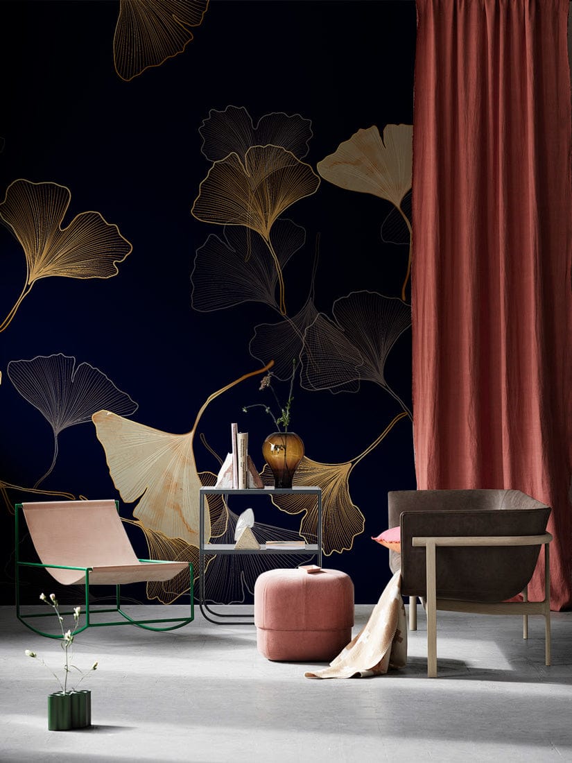 Elegant Gold and Navy Ginkgo Leaf Mural Wallpaper in modern living room with grey flooring, chic furniture.