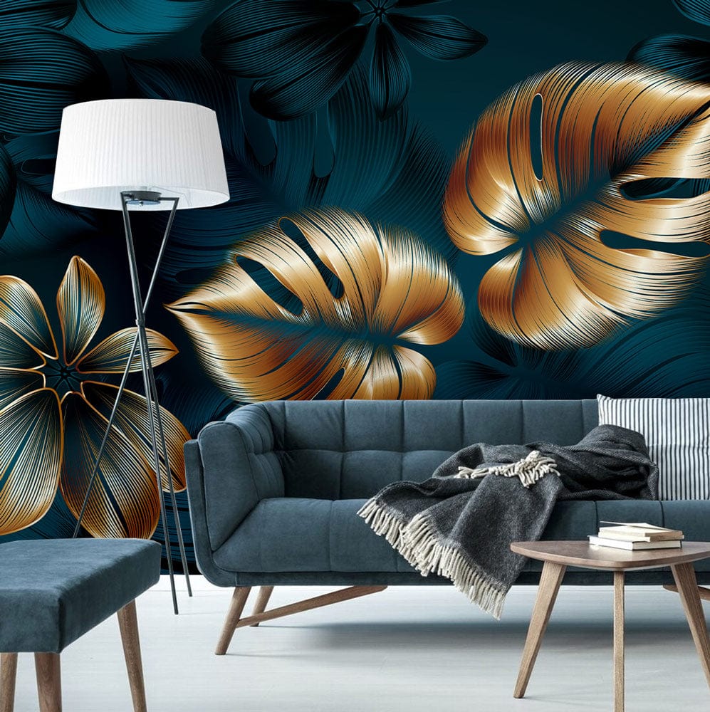 Golden Fern Leaf Elegance mural with navy botanical design, grey sofa, wooden flooring, stylish lamp.