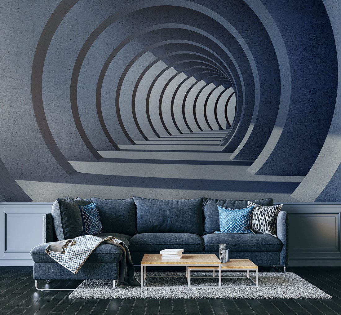 Modern grey tunnel illusion mural wallpaper in living room, dark sofa, wooden coffee table, sleek flooring.