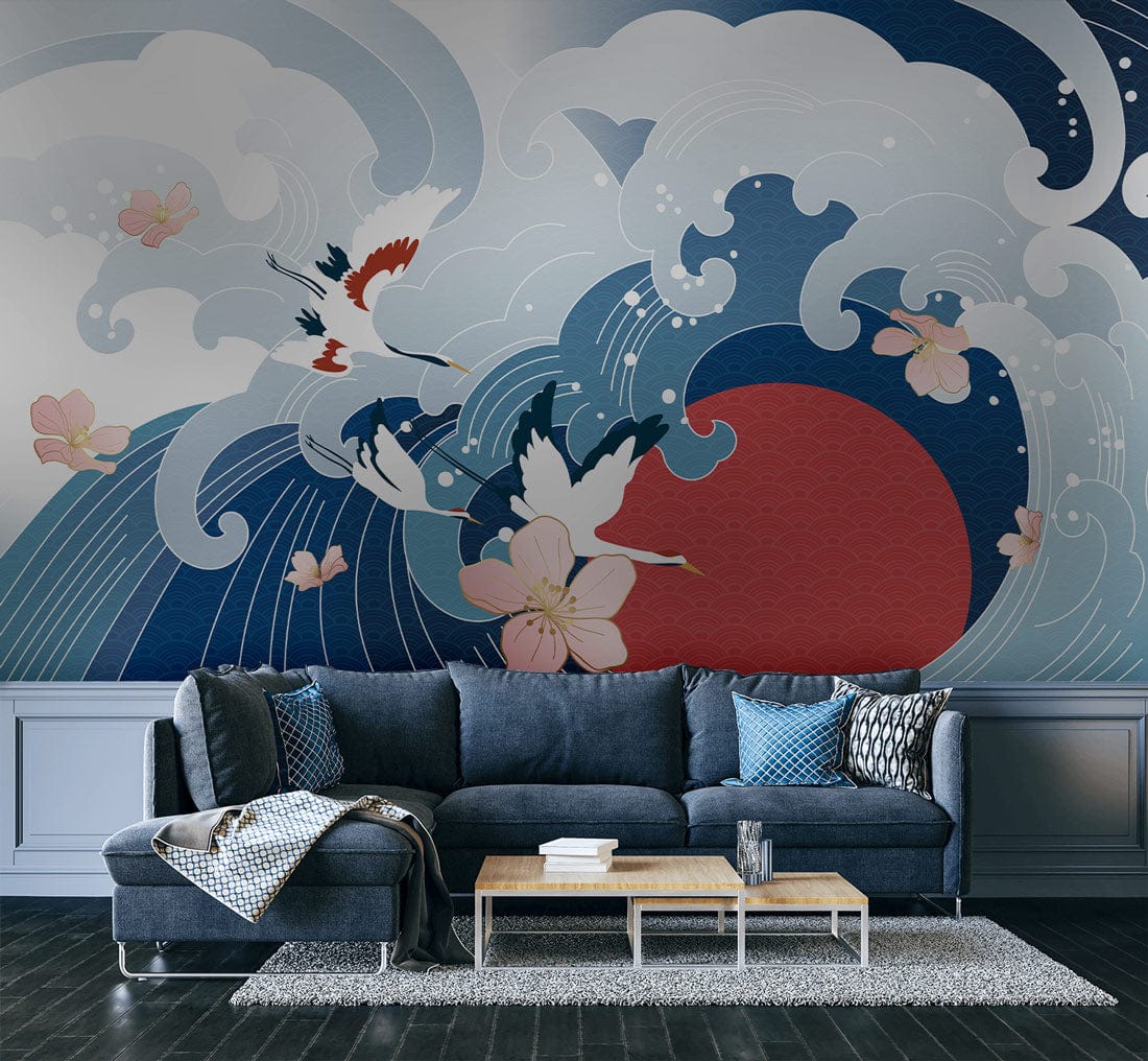 Elegant Japanese wave mural wallpaper featuring cranes, cherry blossoms; navy sofa, wooden coffee table, grey rug.