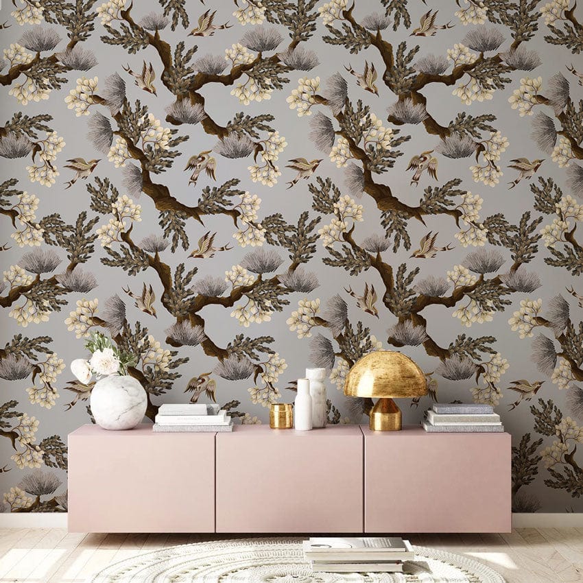 Vintage botanical wallpaper in grey and brown, with modern pink sideboard in elegant living room.