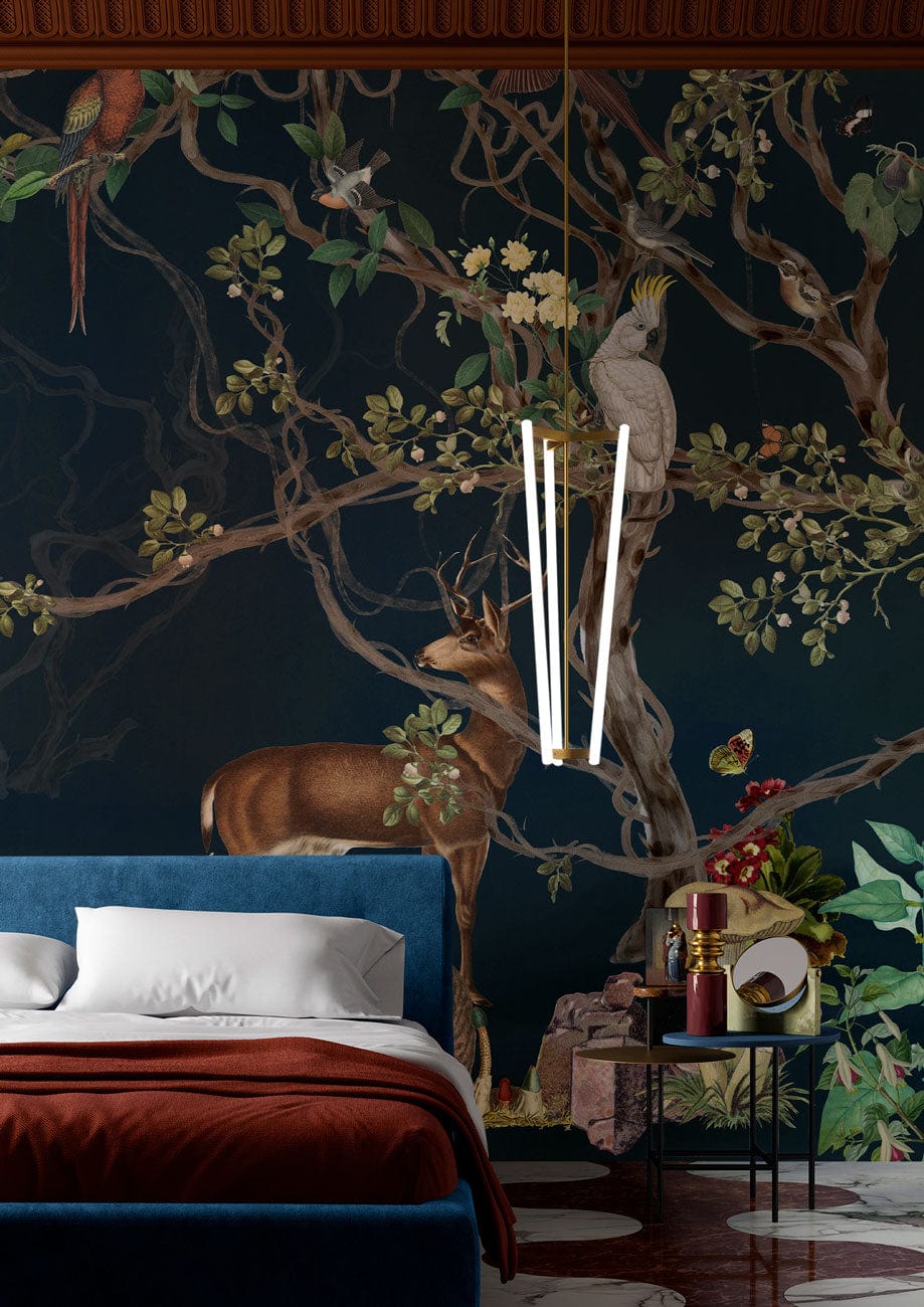 Exotic Wildlife Scene Botanical Wallpaper in dark green decor, featuring blue velvet bed in bedroom.