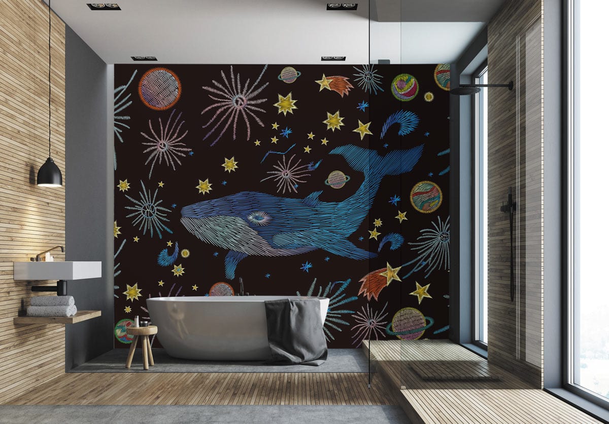 Cosmic Whale Adventure mural wallpaper in bathroom with stone flooring, wooden panels, and freestanding tub.