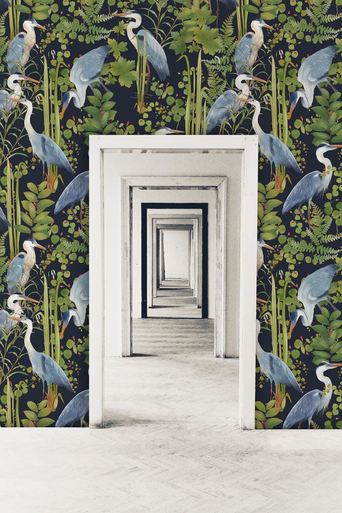 Elegant Blue Heron wallpaper featuring green botanical pattern with white door, hallway illusion effect.