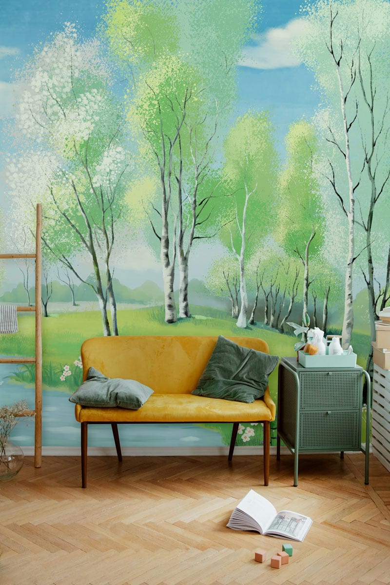 Tranquil Spring Birch Forest Mural Wallpaper, mustard yellow sofa, herringbone flooring, green side table.