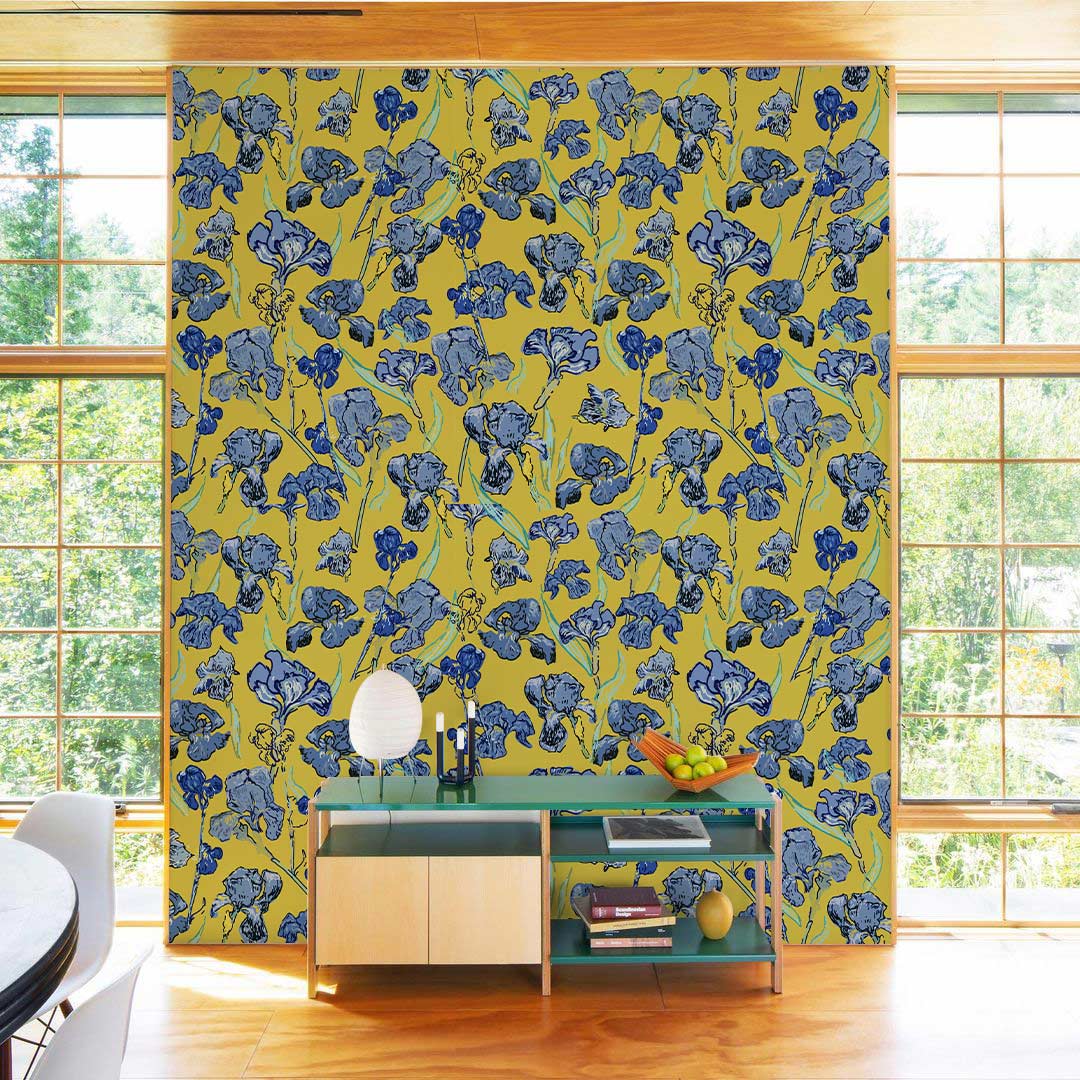 Vintage blue floral wallpaper on yellow background, modern wooden flooring, glass windows, chic sideboard.