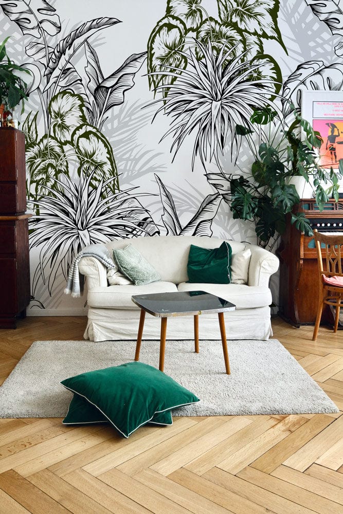 Tropical Green Botanical Jungle Pattern Wallpaper, monochrome elegance, white sofa, wooden flooring, living room.