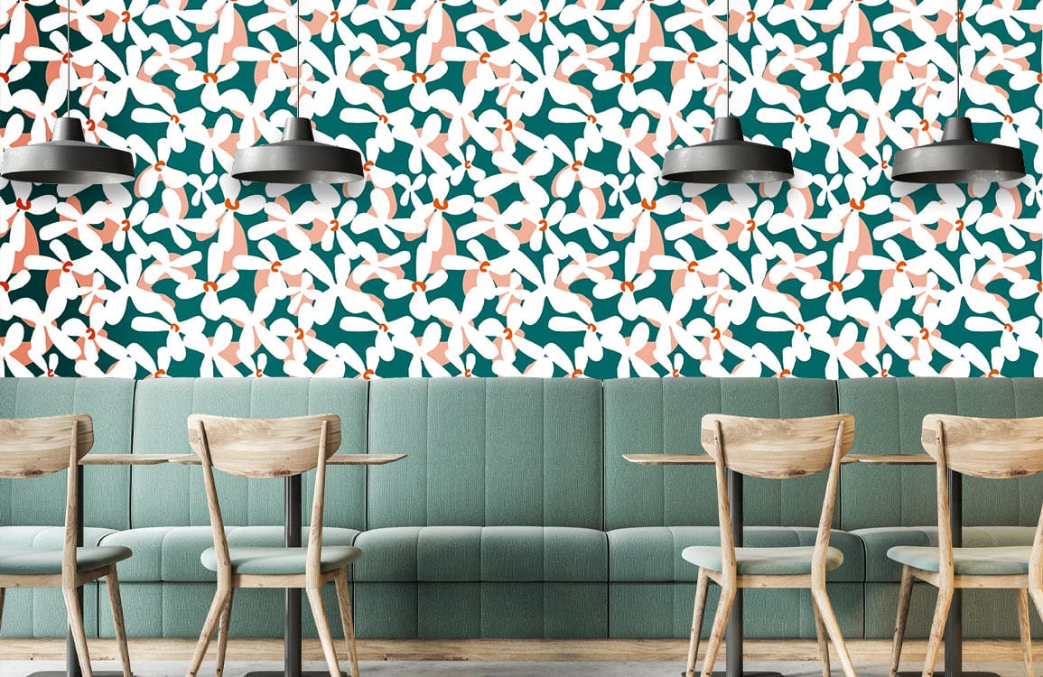 Elegant green and white birds mural wallpaper, modern café setting, featuring wooden chairs and lighting.