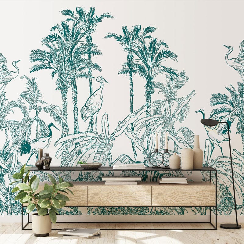 Tropical Safari Green Jungle Mural Wallpaper with console table, plant, and minimalist living room decor.