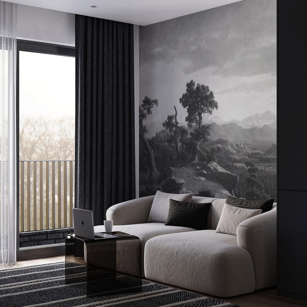 Monochrome mountain mural wallpaper in modern living room with beige sofa and dark curtains.