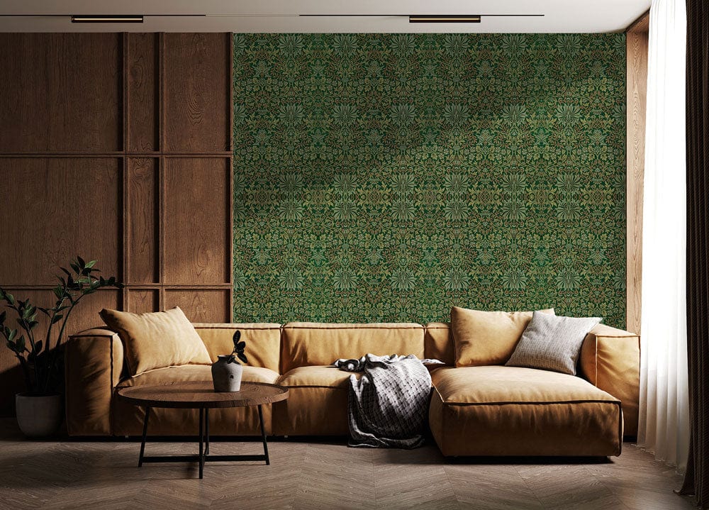 Elegant Victorian green botanical wallpaper; vintage floral decor with brown sofa, wooden panelling, herringbone flooring.