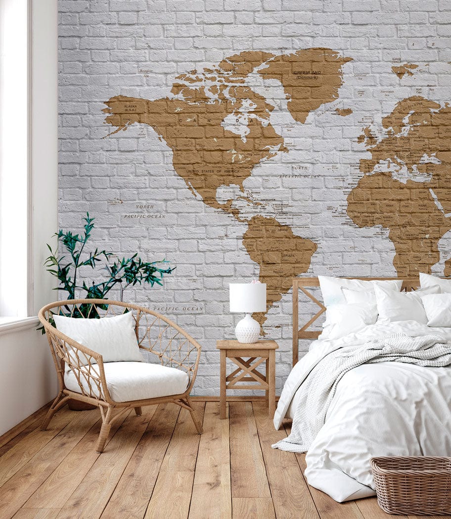 Vintage Brick World Map Mural Wallpaper, rustic brown and white, in bedroom with wooden flooring.