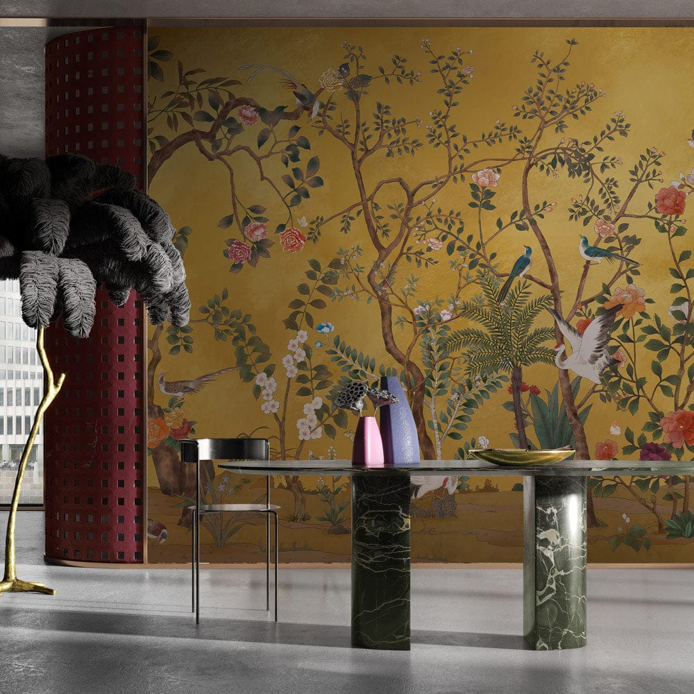 Golden Chinoiserie Garden Mural Wallpaper, vibrant birds, floral design, sleek modern furniture, marble table.