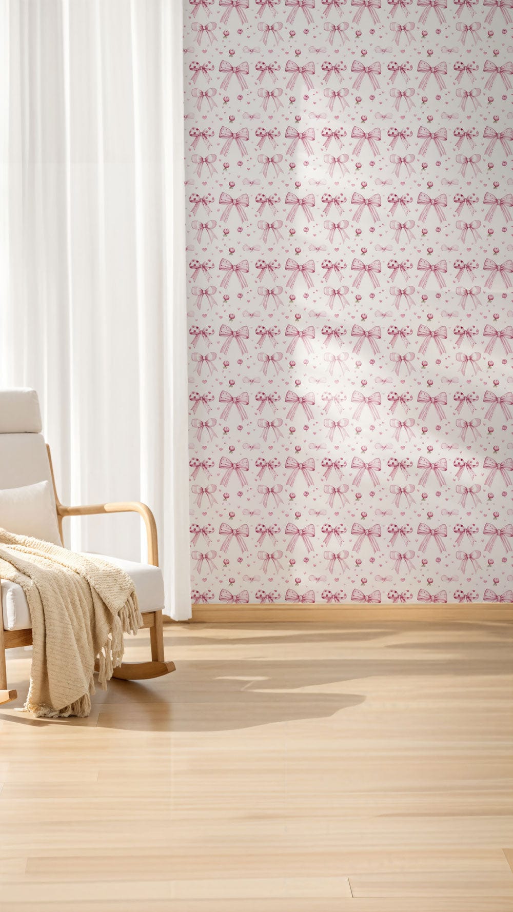 Elegant pink floral wallpaper in bright room with light wood flooring and modern beige armchair.