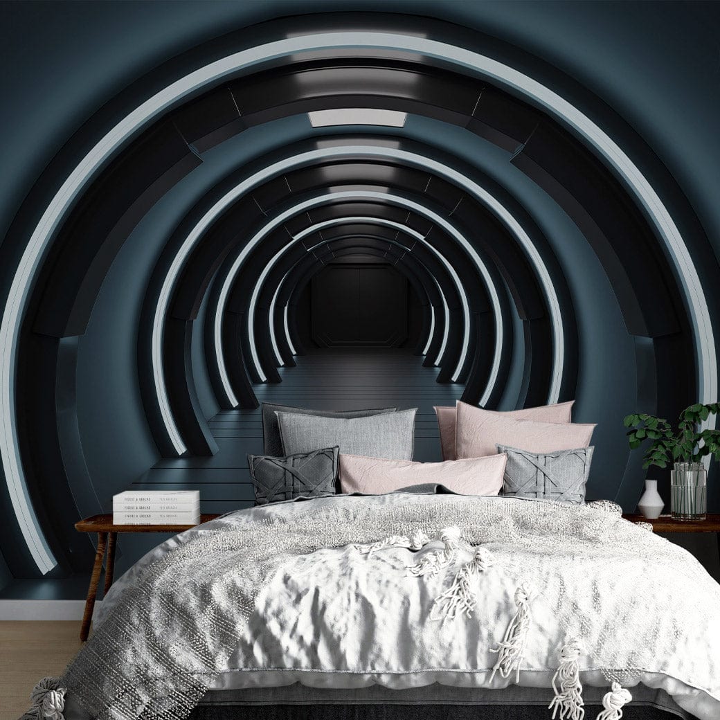 Futuristic blue neon tunnel wallpaper in modern bedroom with grey sofa, textured bedding, and wooden flooring.