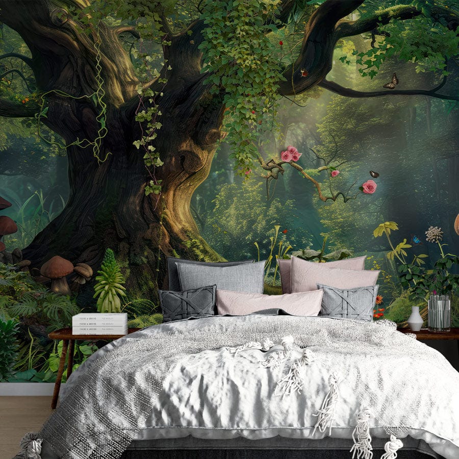 Enchanted Forest Mural Wallpaper; lush greenery in bedroom with grey sofa, wooden flooring, mystical decor.