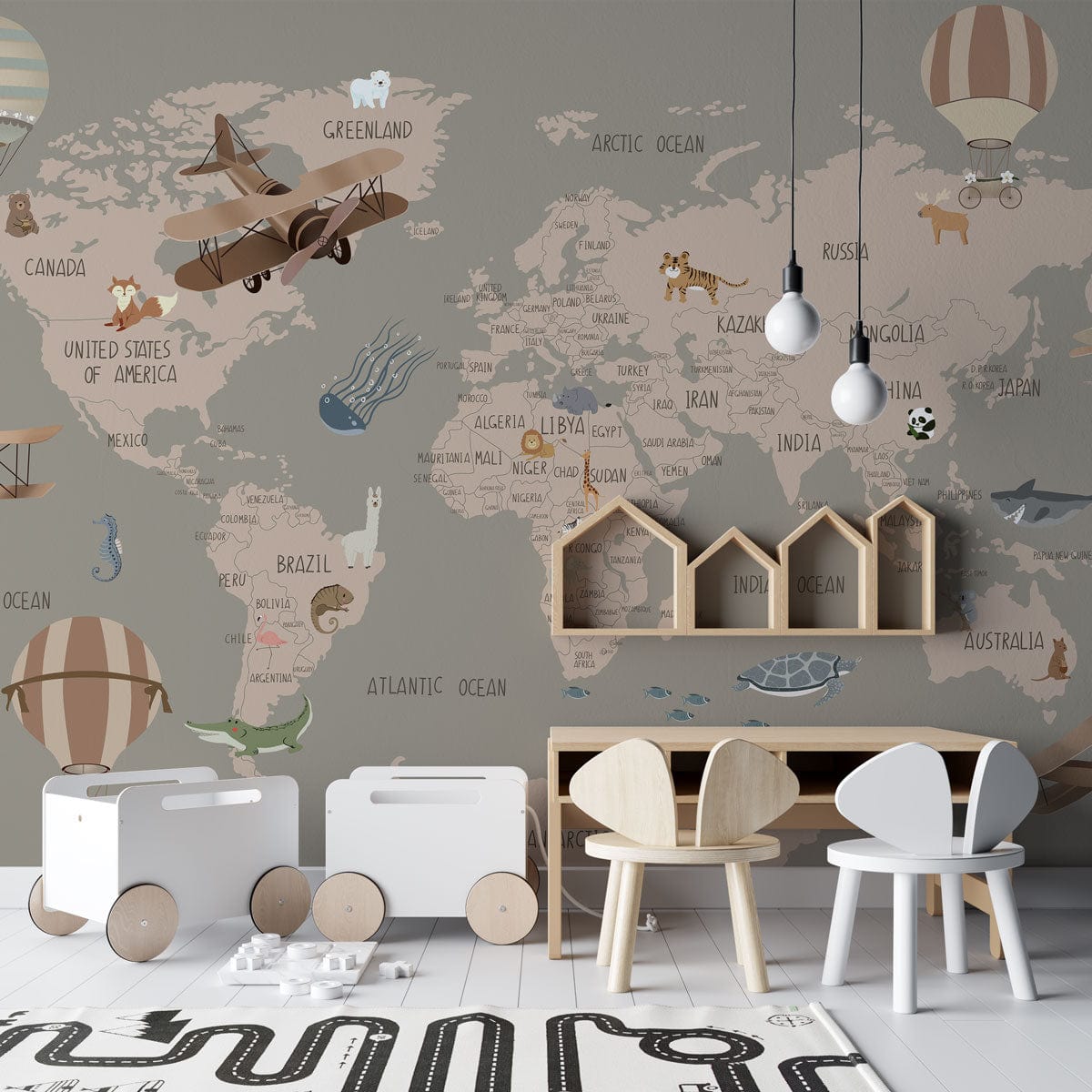 Children's playroom styled with taupe toned vintage world map mural wallpaper, featuring aeroplanes and animals.