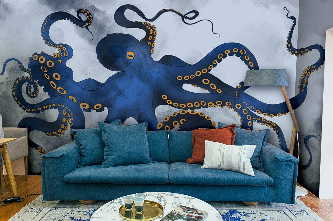 Deep Blue Ocean Octopus Mural Wallpaper with blue sofa, wooden flooring, and stylish floor lamp.