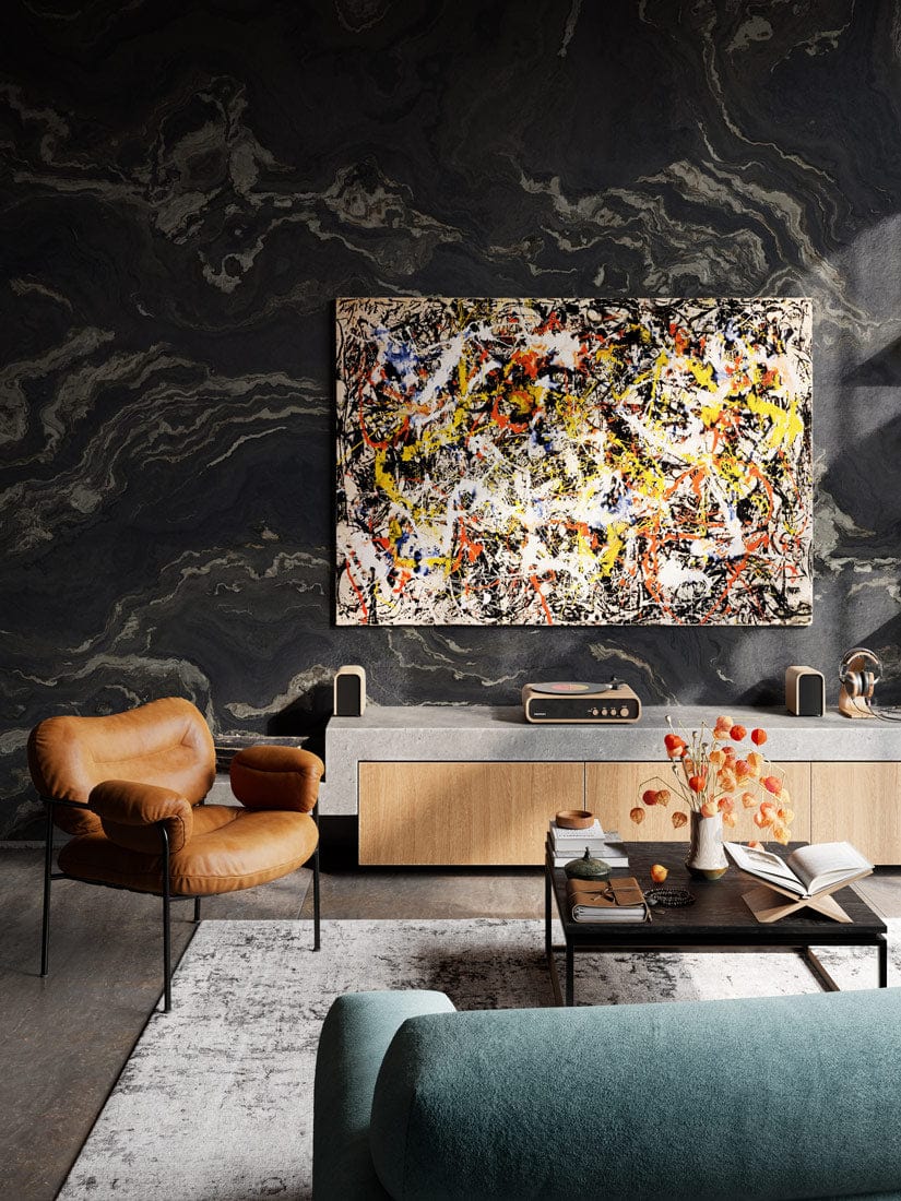 Charcoal marble wallpaper in modern living room, leather armchair, abstract art, and neutral furniture.