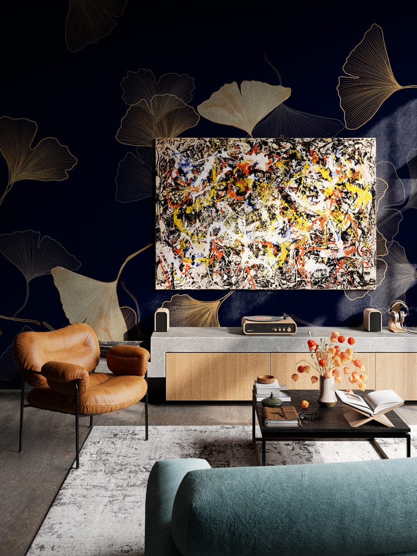 Elegant gold and navy ginkgo wallpaper, modern mural, leather chair, abstract art, contemporary living room.