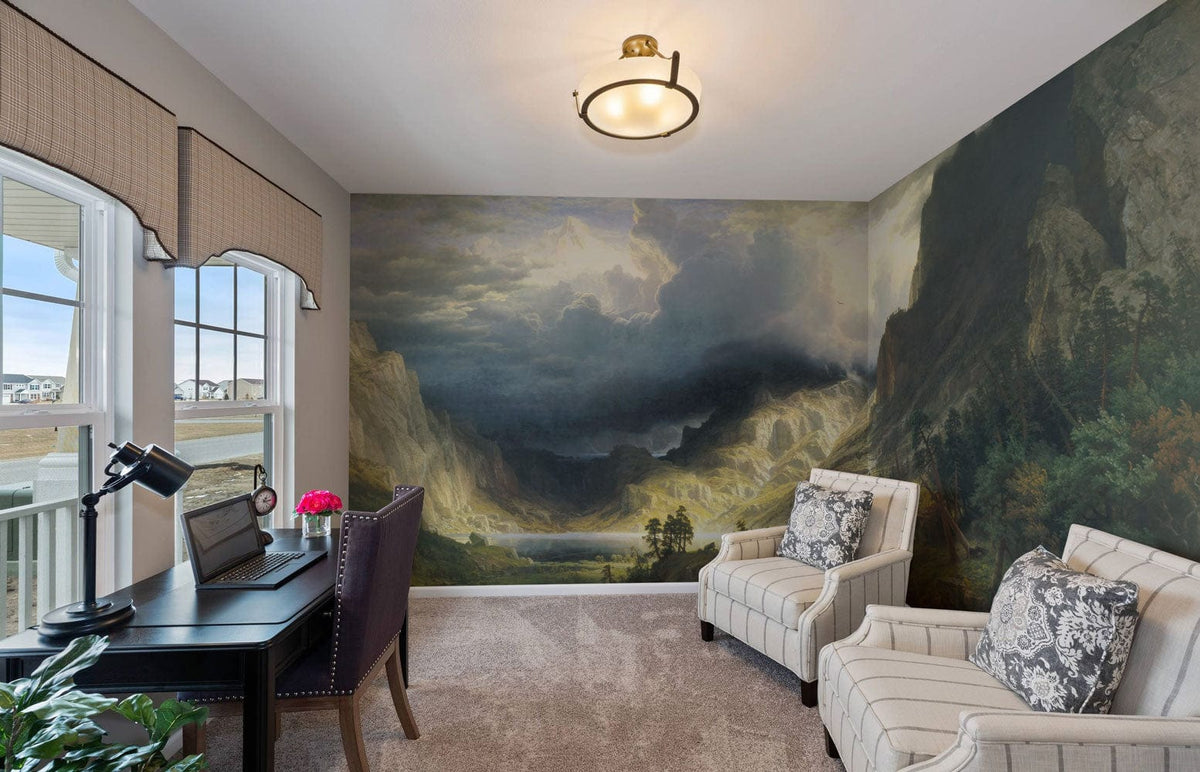 Scenic Mountain Valley mural in office with striped armchairs, beige carpet, black desk, and wall lights.