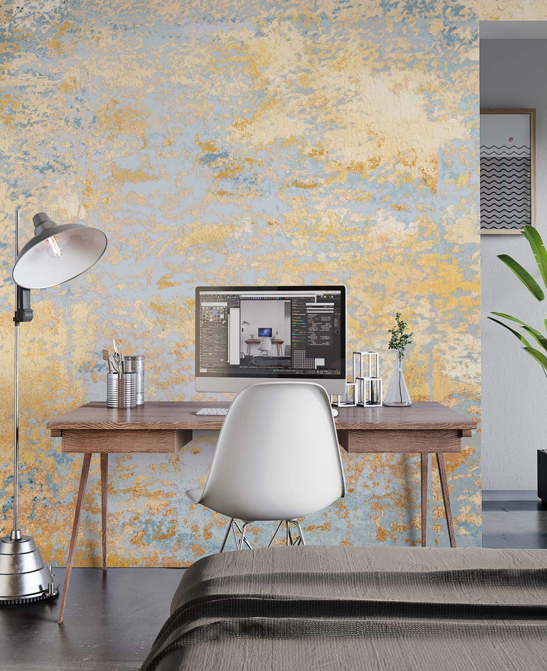 Vintage blue and gold mural wallpaper, desk, chair, lamp in modern home office setting.