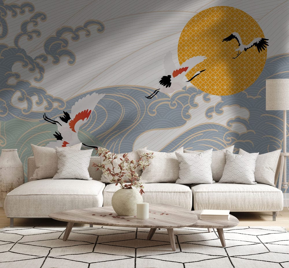 Elegant Crane and Wave Mural Wallpaper; Japanese vintage design, beige sofa, wooden flooring, geometric rug.
