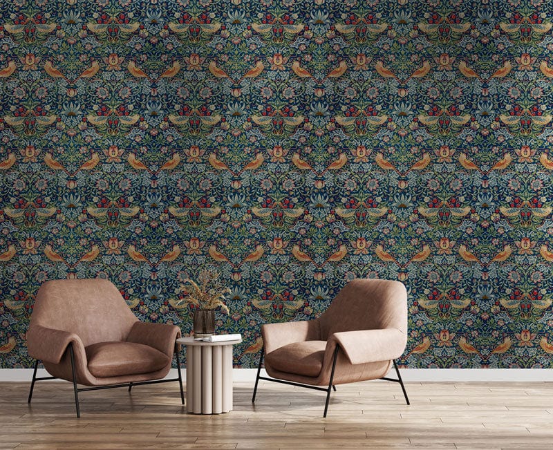 Floral Birds Victorian style wallpaper with tan armchairs and wooden flooring in a cosy living room.