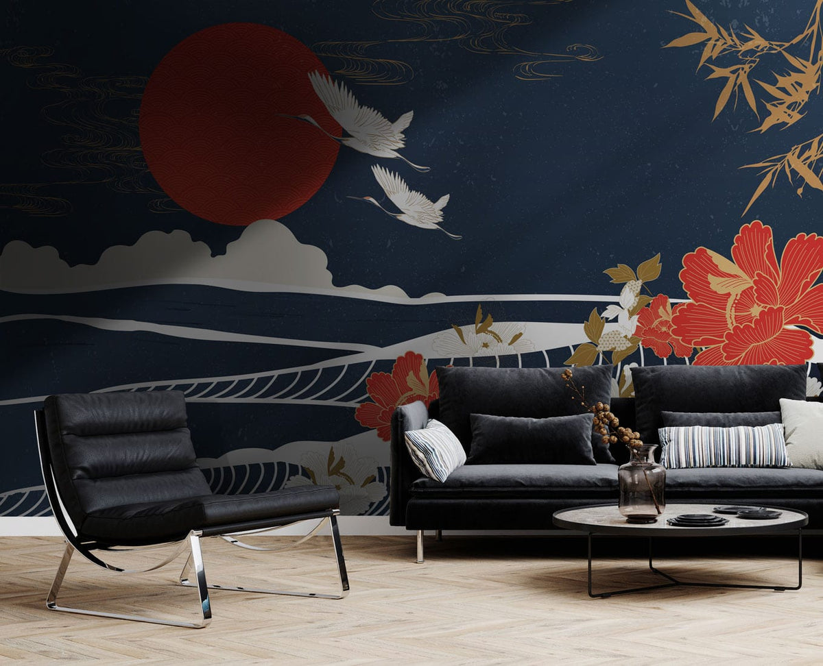 Japanese Crane Mural Wallpaper with red sun, floral waves, dark blue wall, black sofa, wooden floor.