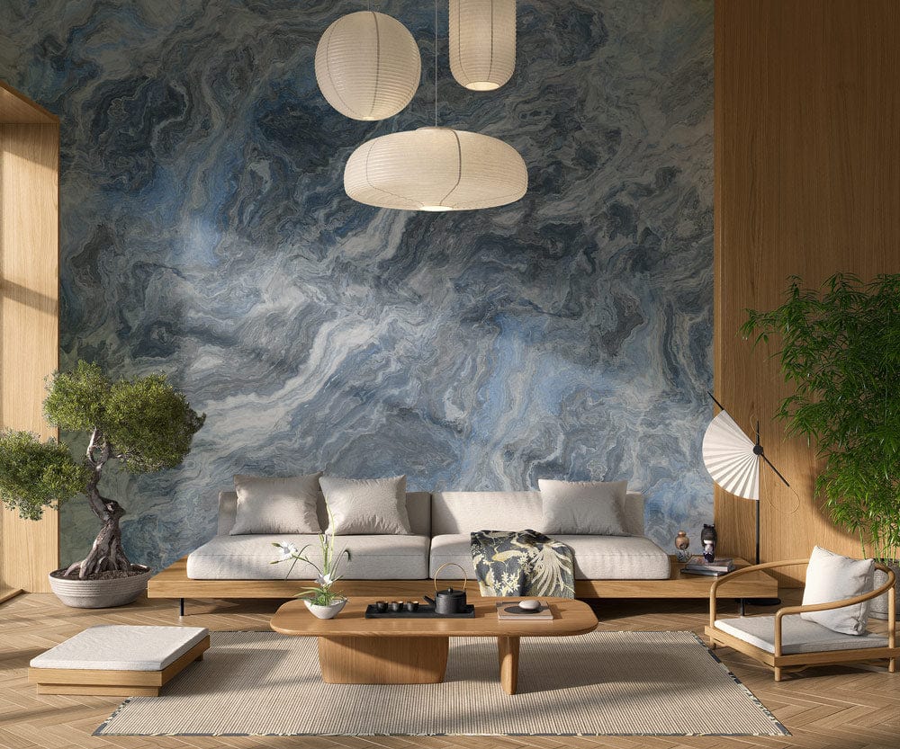 Elegant blue and grey marble effect wallpaper in stylish living room with modern Japanese-style furniture.