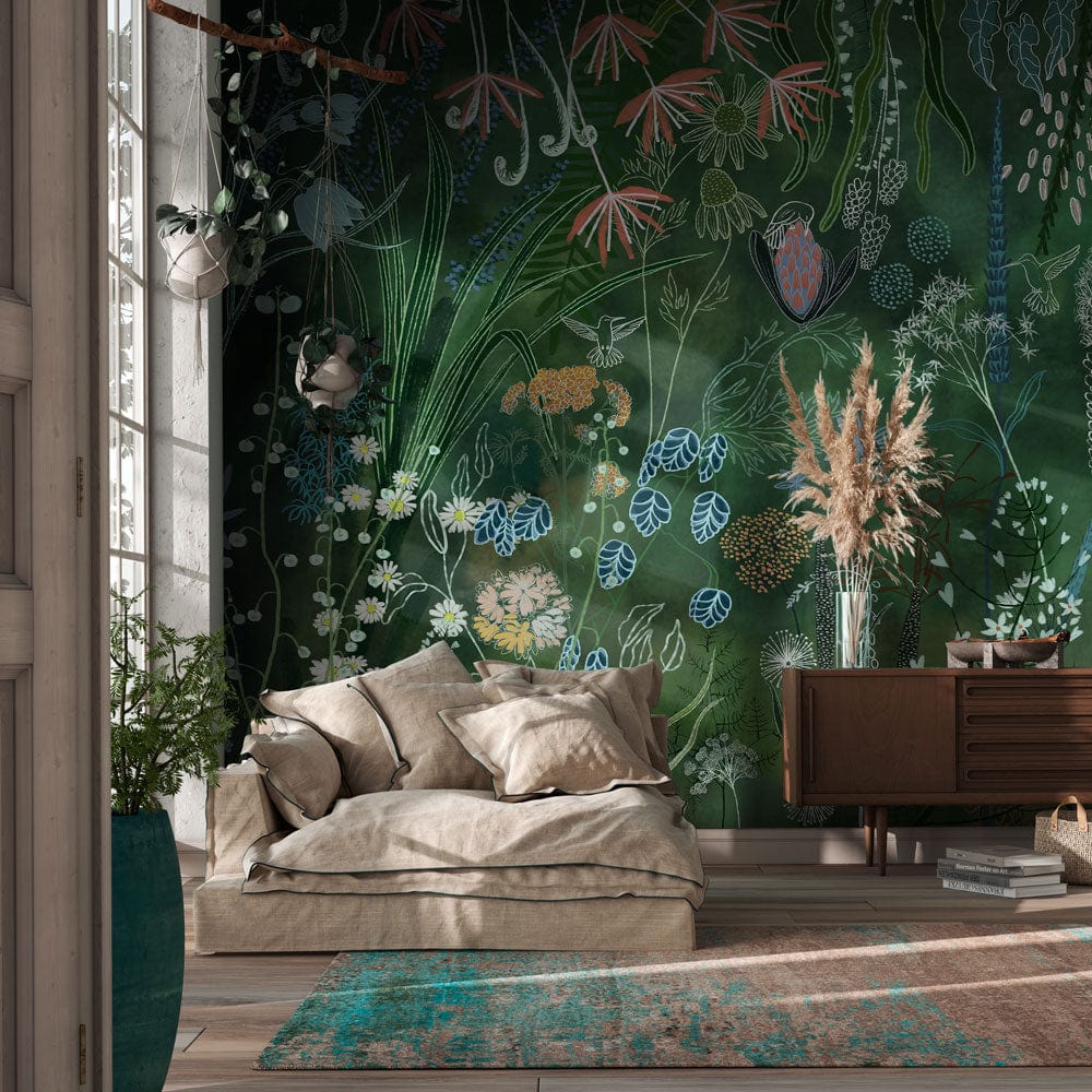 Botanical mural wallpaper in green room with beige sofa, wooden console, and vibrant floral design.