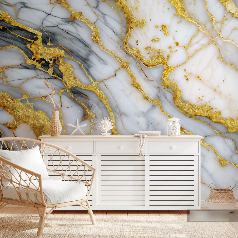 Luxurious gold-veined marble wallpaper with rattan chair and white sideboard in elegant room setting.