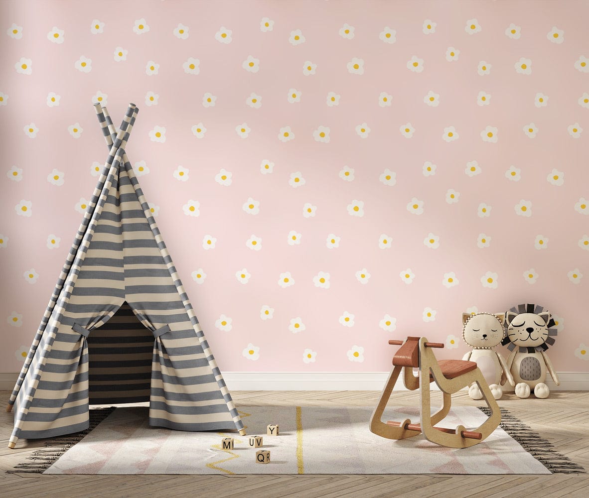 Pastel pink floral wallpaper in child's room with striped tent, wooden rocker, and playful decor.