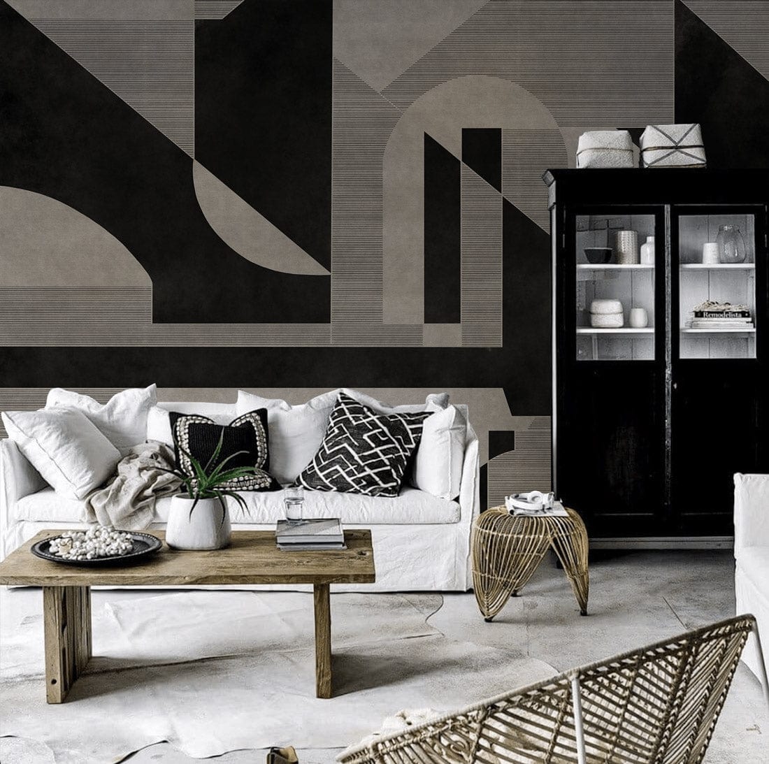 Monochrome Art Deco wallpaper in black-grey tones, white sofa, wooden coffee table, black cabinet.