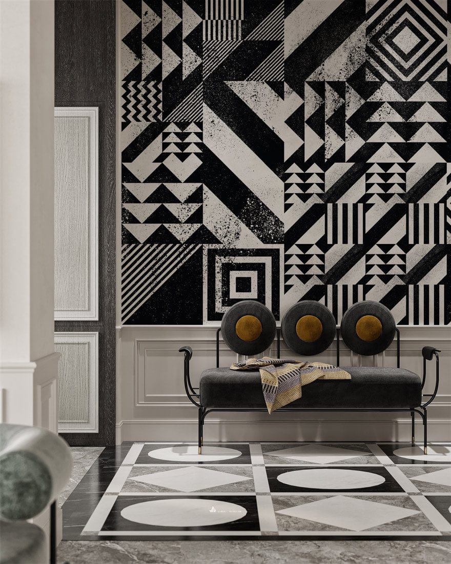 Monochrome geometric wallpaper, black and white Art Deco, grey modern sofa, marble flooring in lounge.