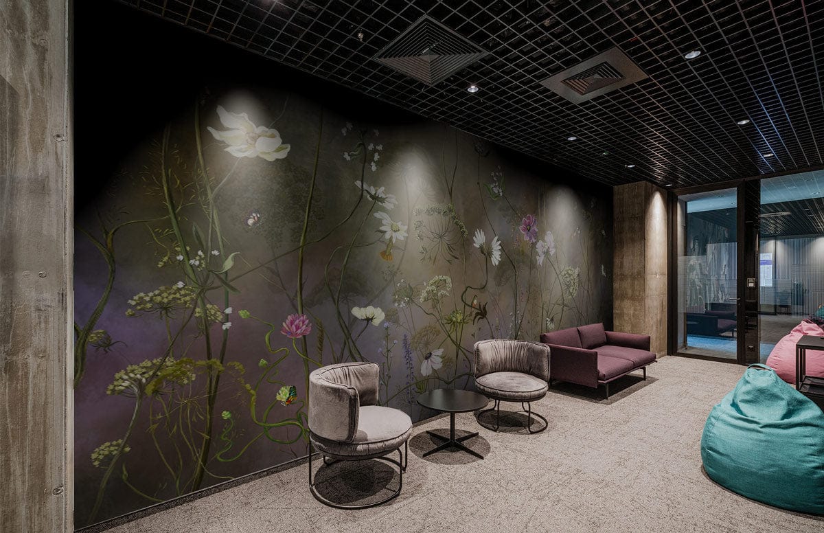 Elegant wildflower mural in modern room with purple sofa, grey chairs, and earthy decor.