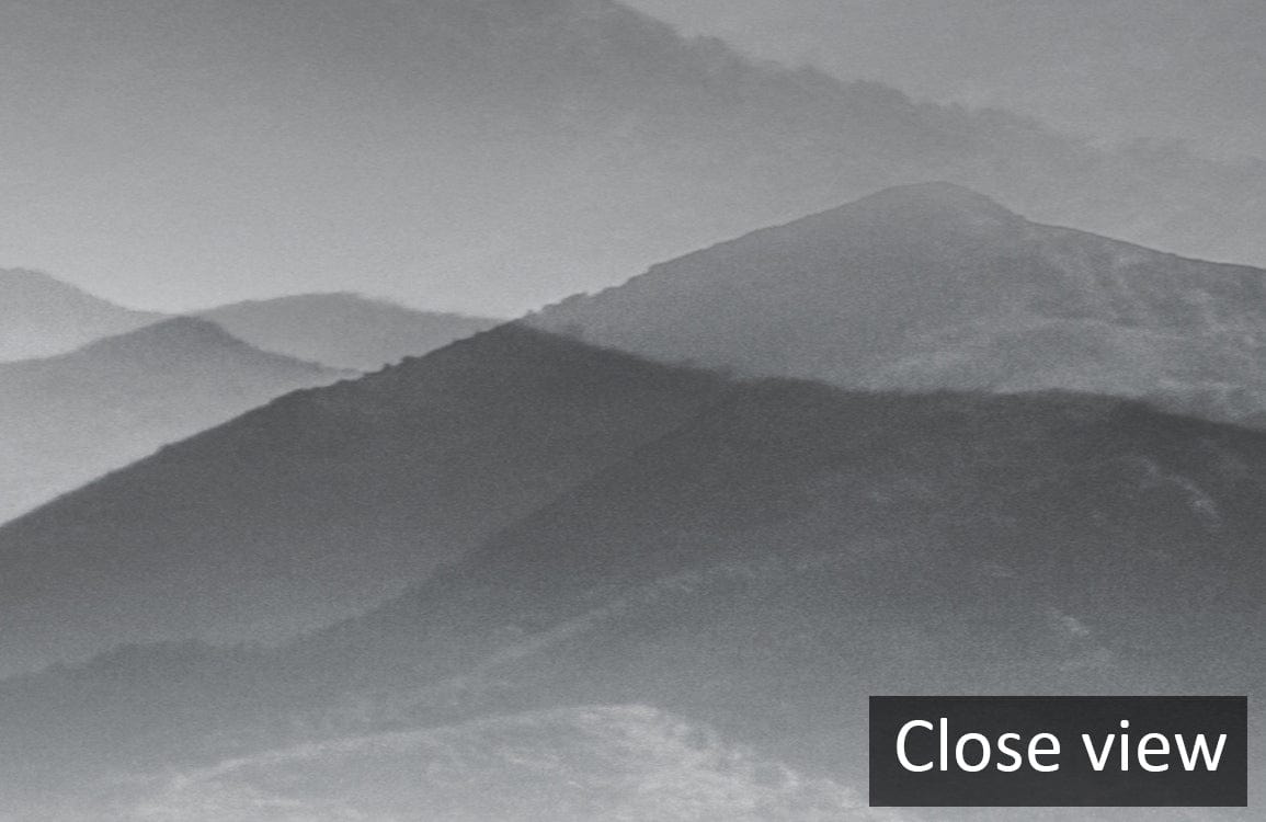 Serene Misty Mountain Landscape Mural Wallpaper, monochrome grey tones, close view, wall mural design.
