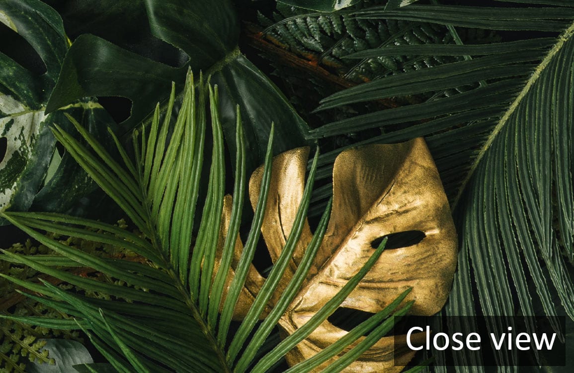 Luxurious golden tropical leaves wallpaper, bold green botanical design close-up, detailed texture view.