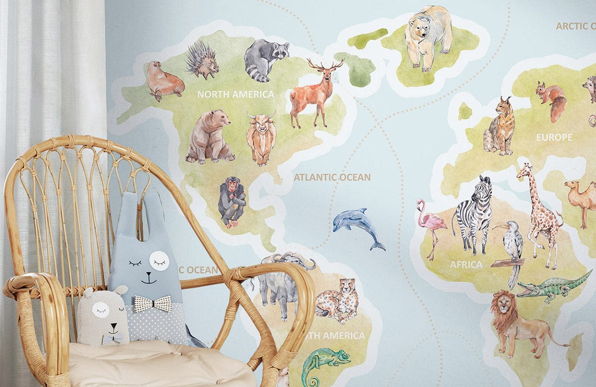 Children's animal world map wallpaper mural, natural rattan chair, nursery room, playful educational decor.