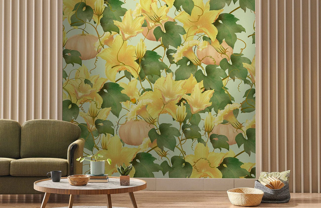 Autumn Pumpkin Vine Floral Wallpaper in botanical mural design; green sofa, wooden coffee table, neutral flooring.