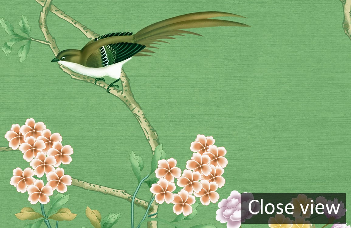 Elegant green chinoiserie wallpaper displaying birds, blossoms; perfect for living room or bedroom decor.