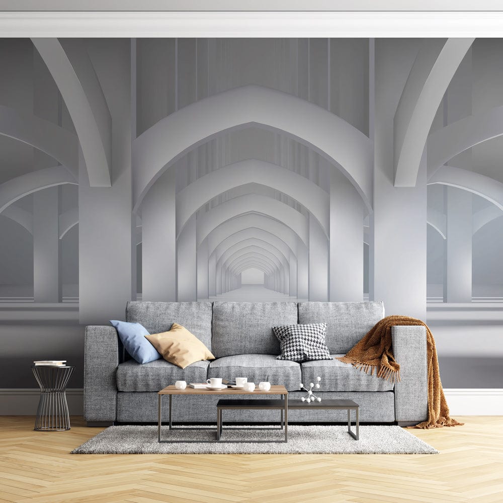 Elegant minimalist white archway mural wallpaper in modern living room with grey sofa and light flooring.