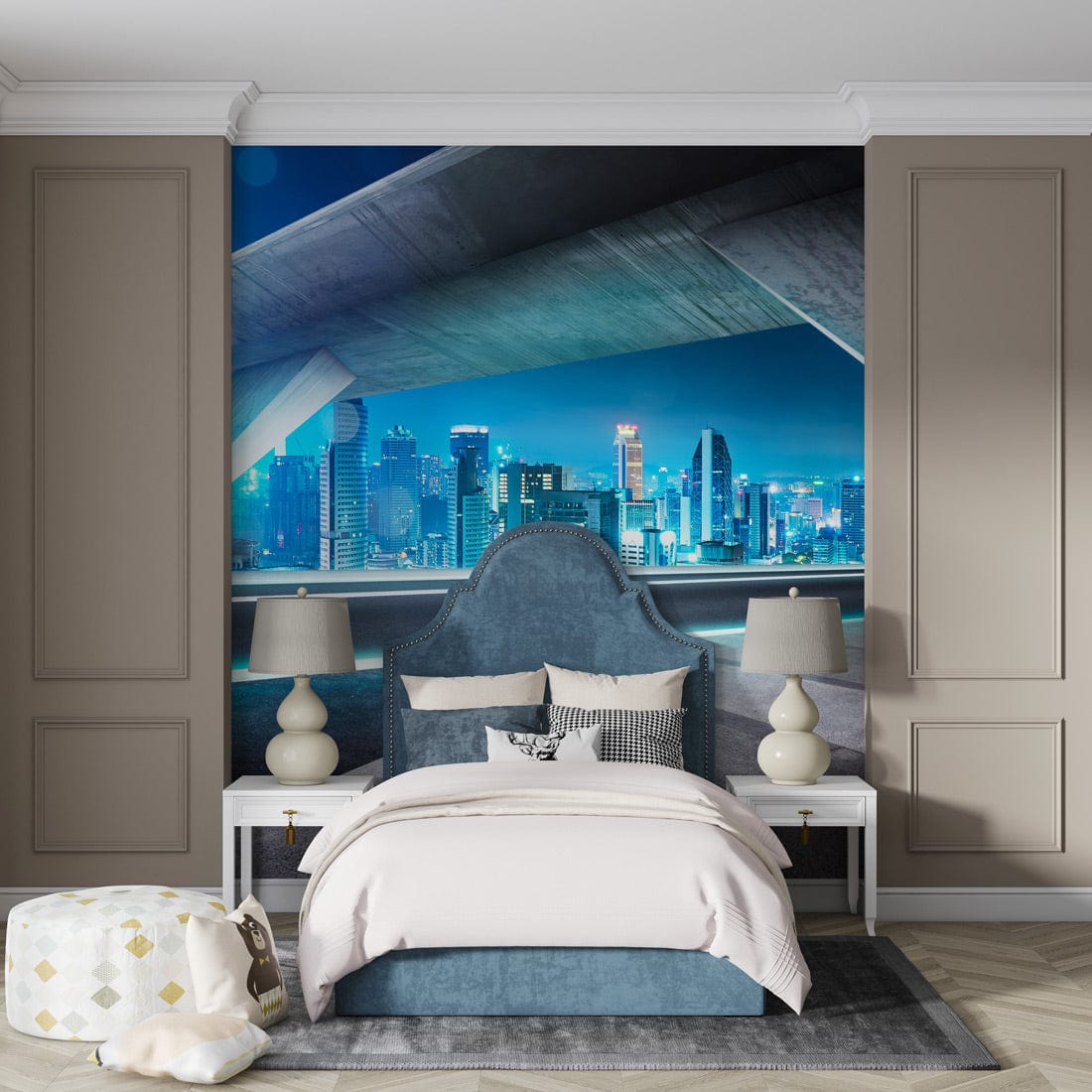 Futuristic mural with vibrant skyline, blue headboard, matching lamps, grey panelled walls, cosy bedroom setting.