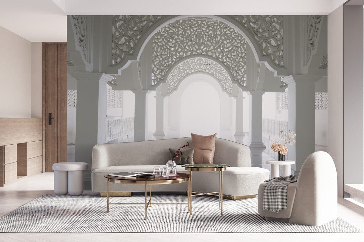 Ornate white archway mural in elegant living room with grey sofa, modern rug, and round tables.