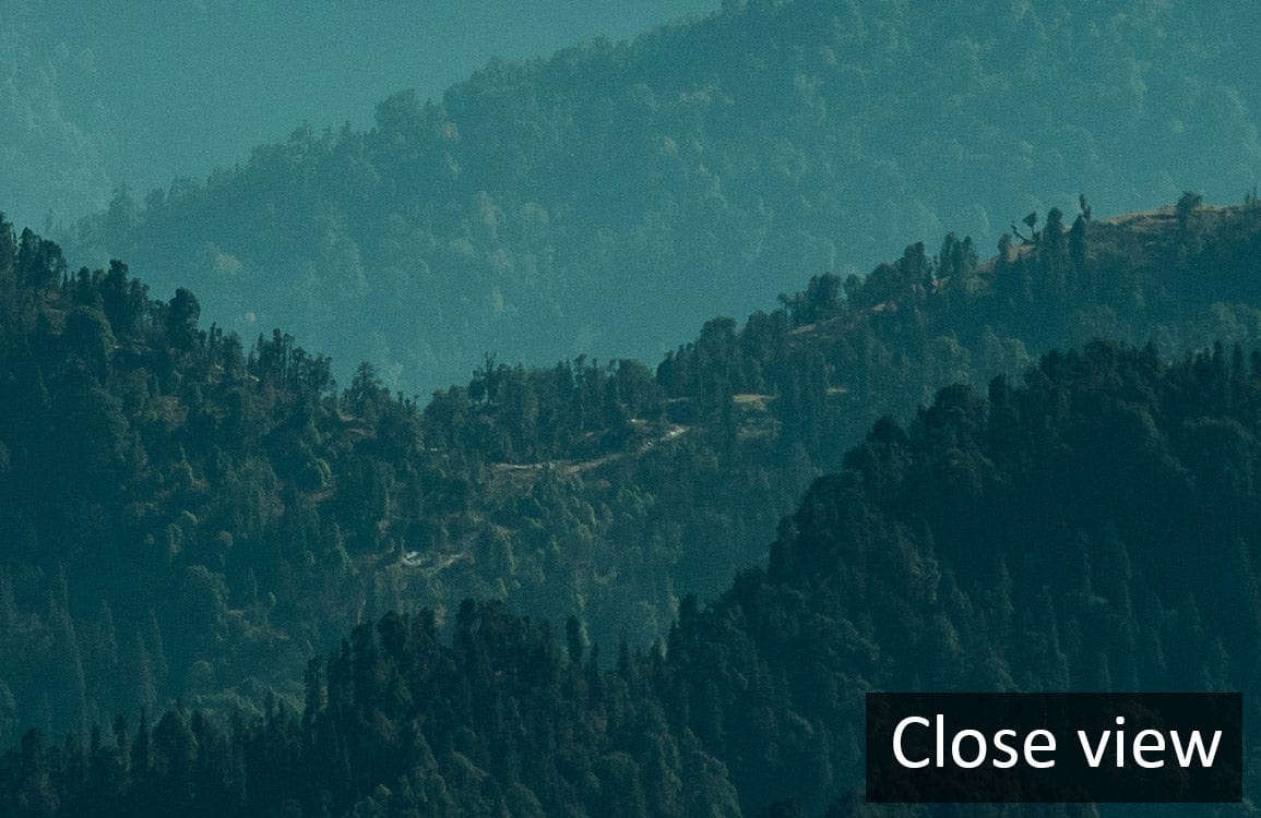 Misty green mountain landscape mural wallpaper for tranquil ambience, close view. Ideal for calming decor.