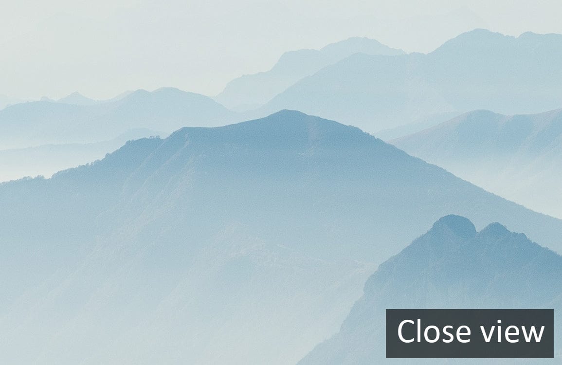Tranquil Mountain Mist mural wallpaper, blue and gold landscape, close-up view, artistic wall decor.