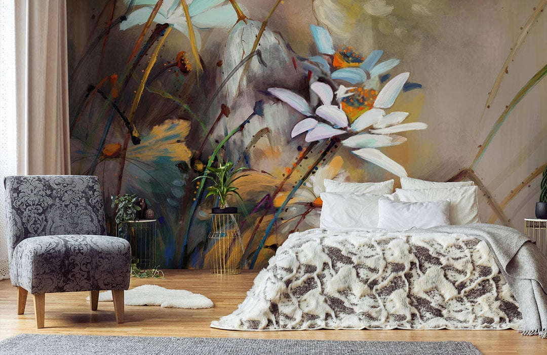 Elegant floral mural wallpaper with daisies, grey patterned chair, cosy bed, hardwood flooring in bedroom.