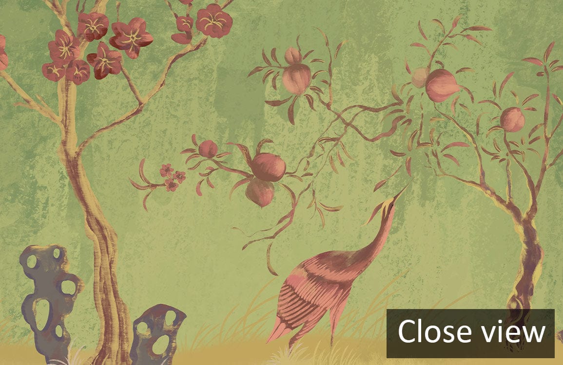 Elegant green chinoiserie wallpaper features birds, blooming trees; ideal for sophisticated living room decor.
