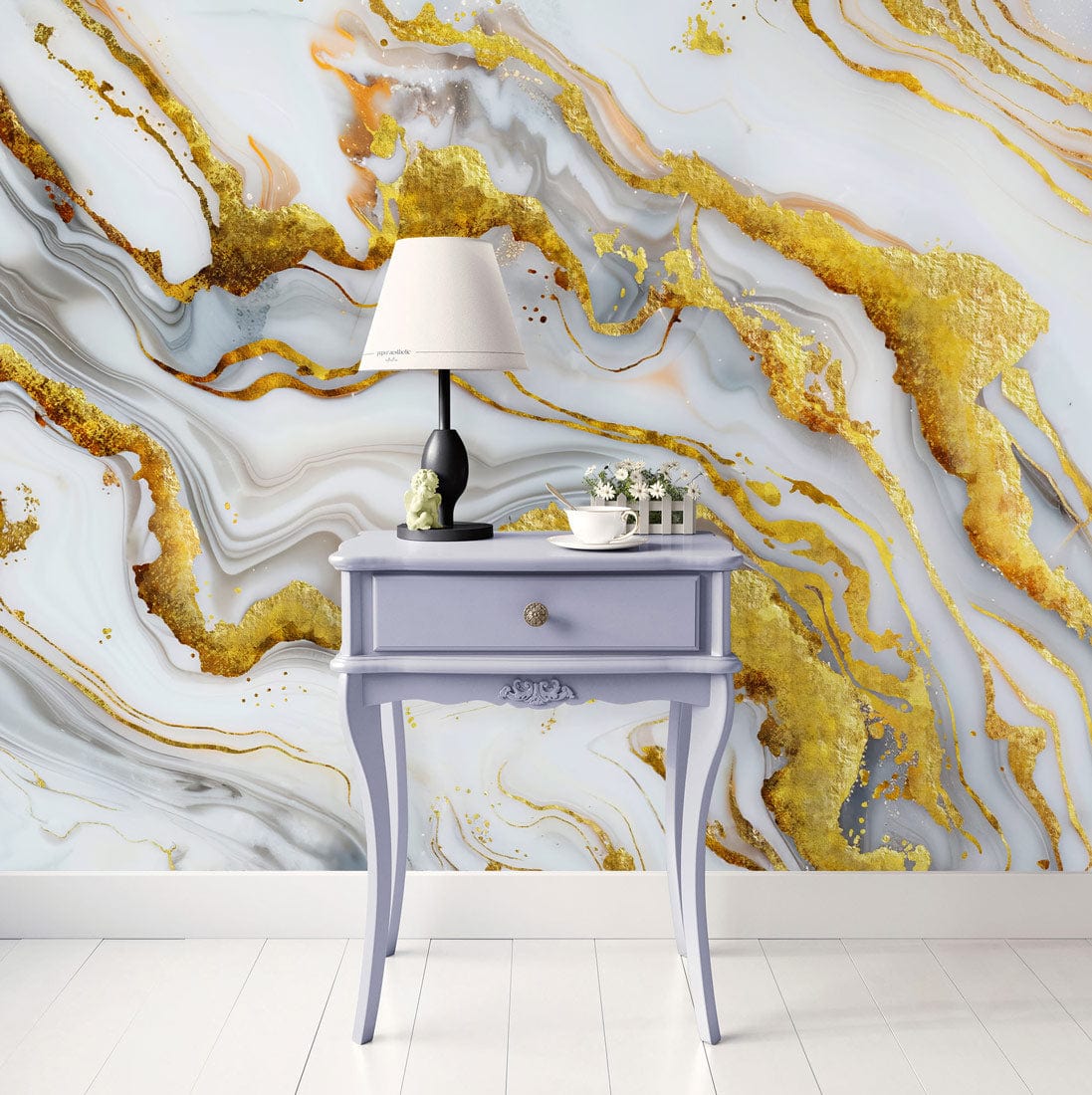 Luxurious gold marble art wall mural with purple table and lamp in stylish living room setting.